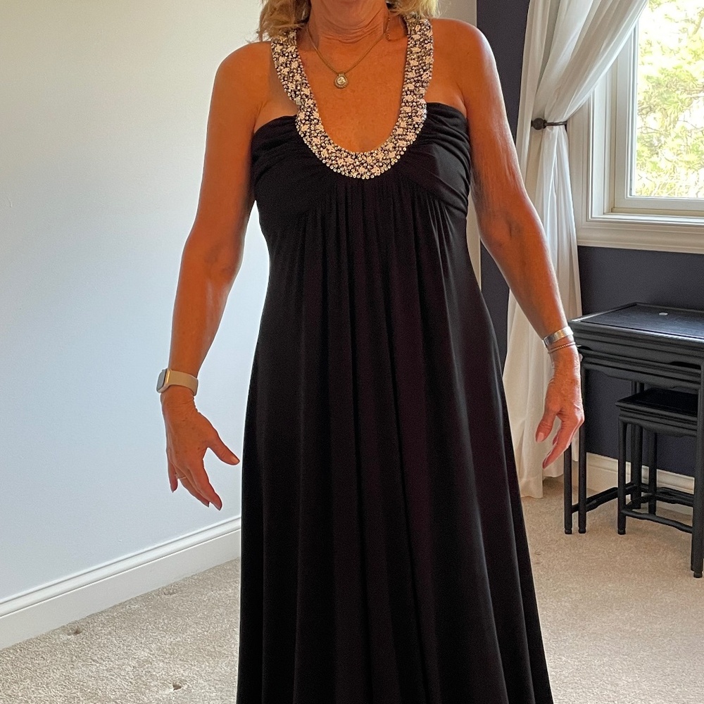Jersey formal dress with jewel accent at the neckline with small train